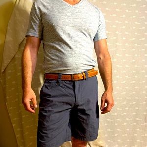 Outfit: shirt, shorts, and belt